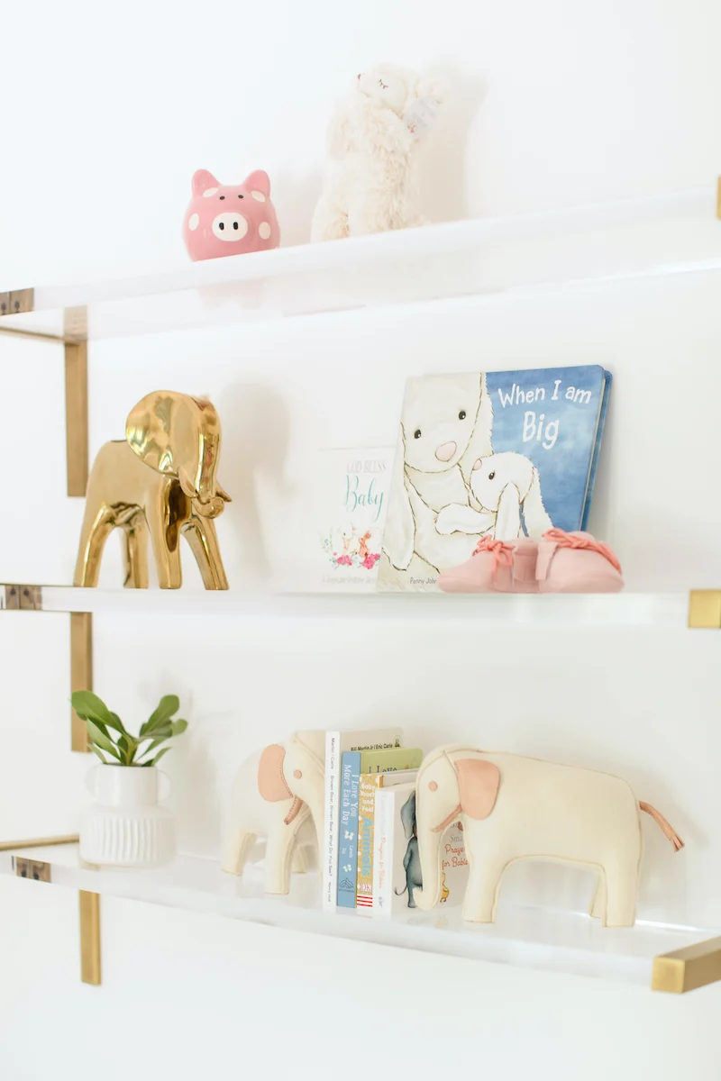 Acrylic Nursery Shelves in nursery by Little Crown Interiors
