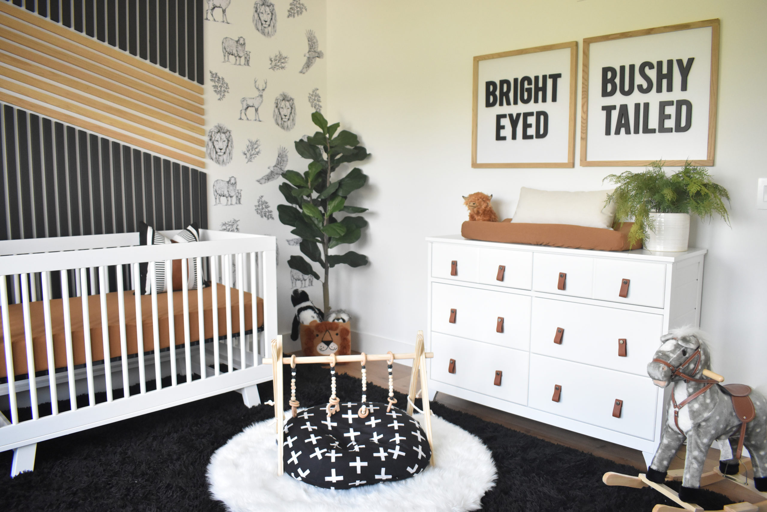 Boys Nursery with DIY Slat Wall and Wild Animal Wall Decals