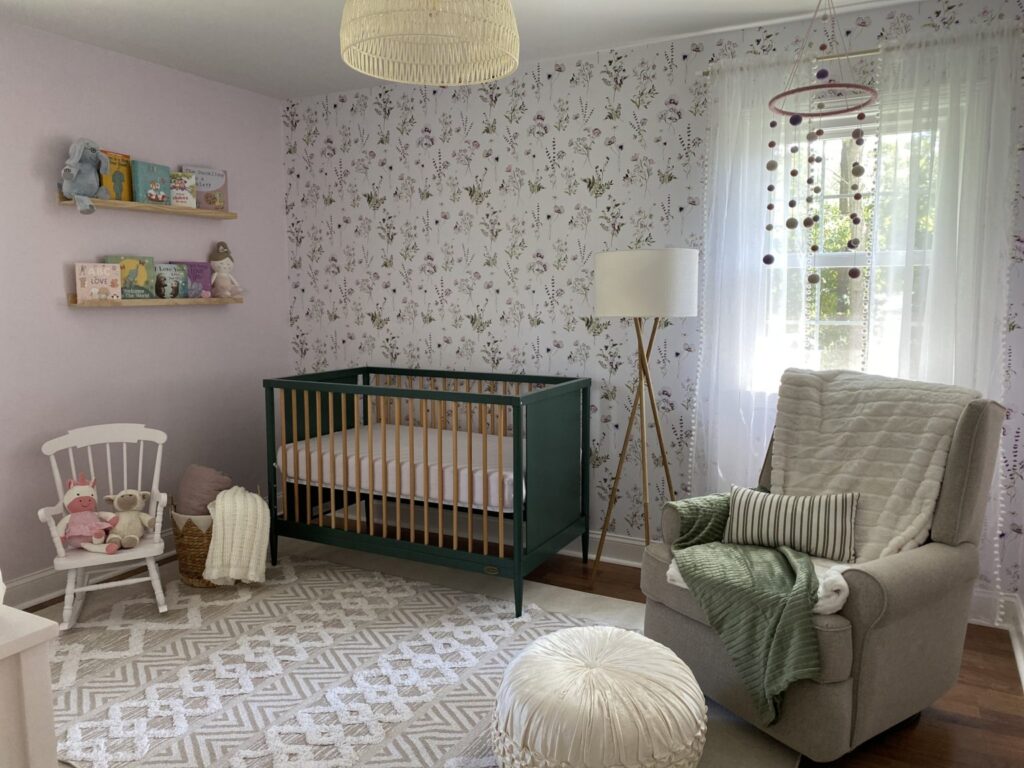 Green Crib in Girl's Nursery with Wildflower Wallpaper