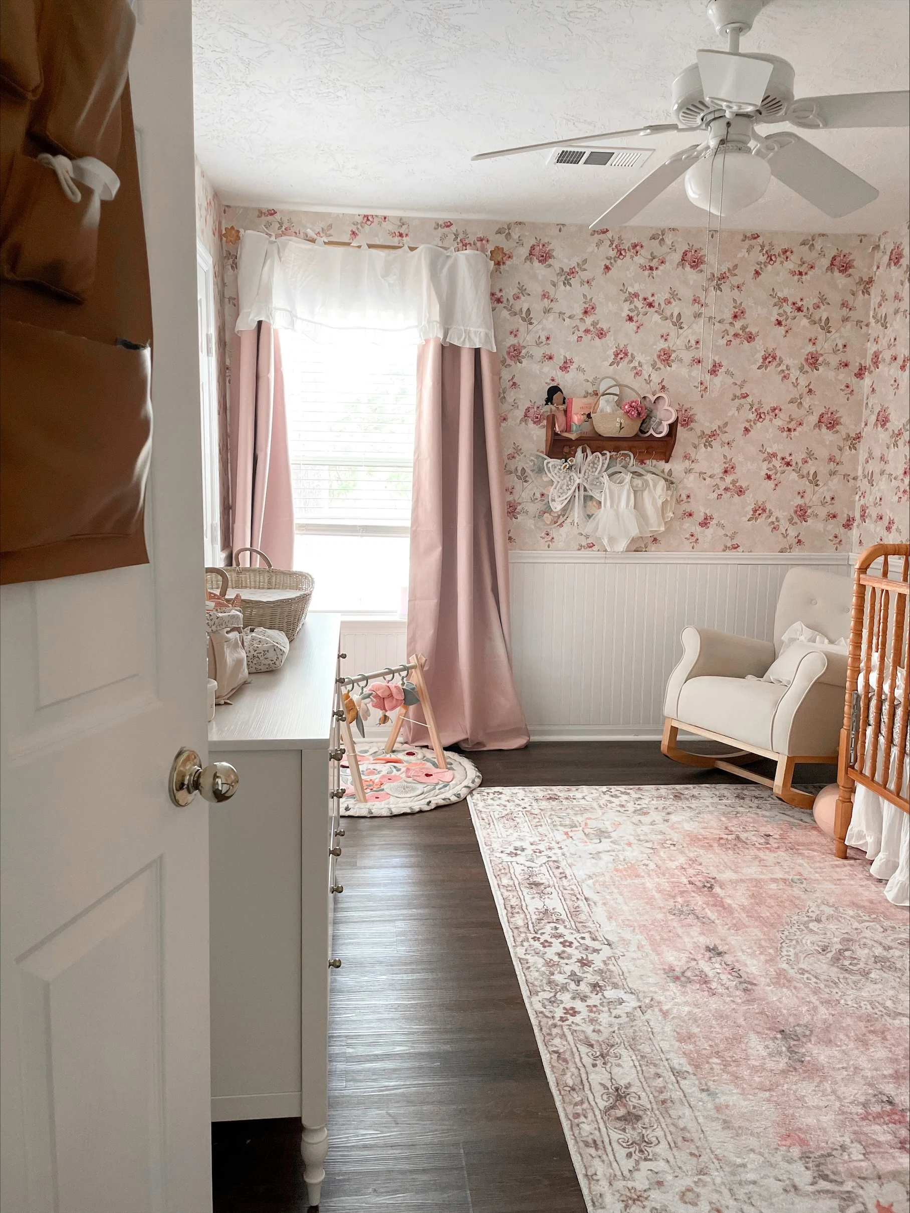 Vintage Inspired Pink Baby Girl Nursery with Floral Wallpaper