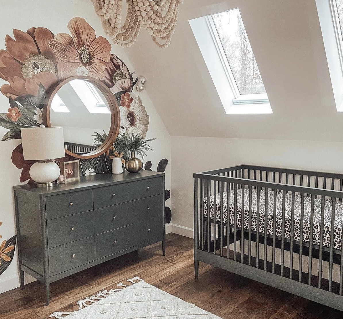 Floral Wall Decals Behind Mirror in Girls Nursery with Forest Green Furniture